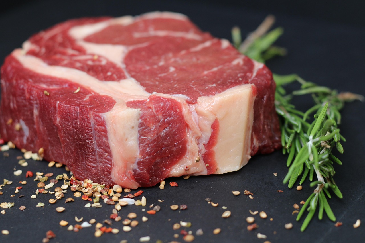 Red meat steak and beer which are common gout triggers