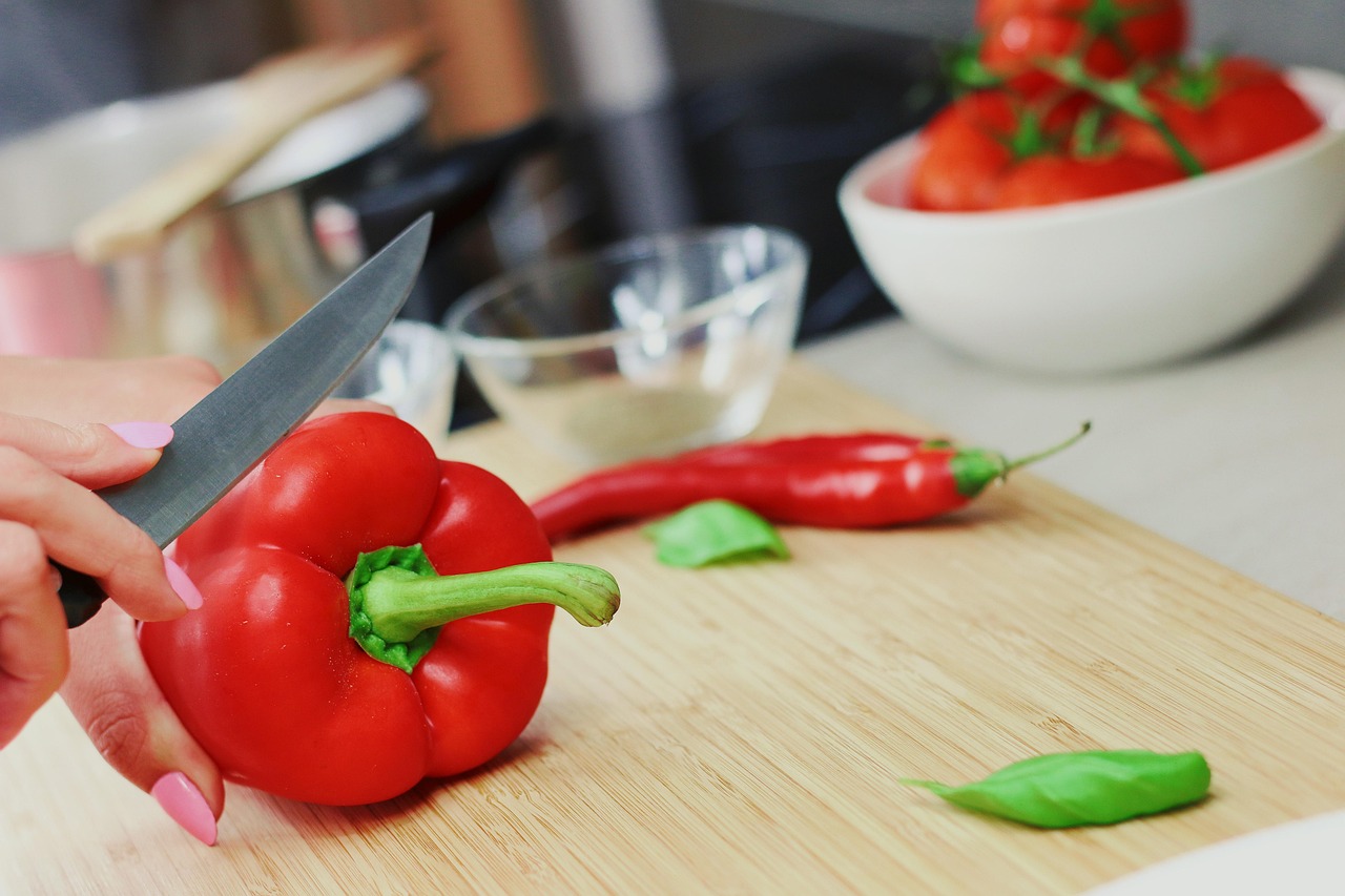 Fresh vegetables on a cutting board, preparing for a healthy meal