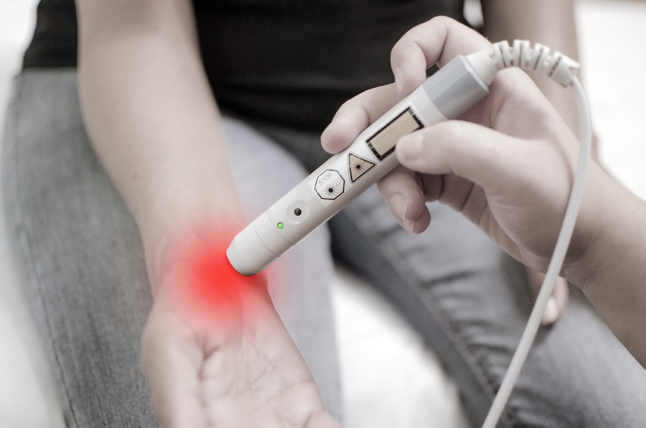 A person gripping their joint in severe pain