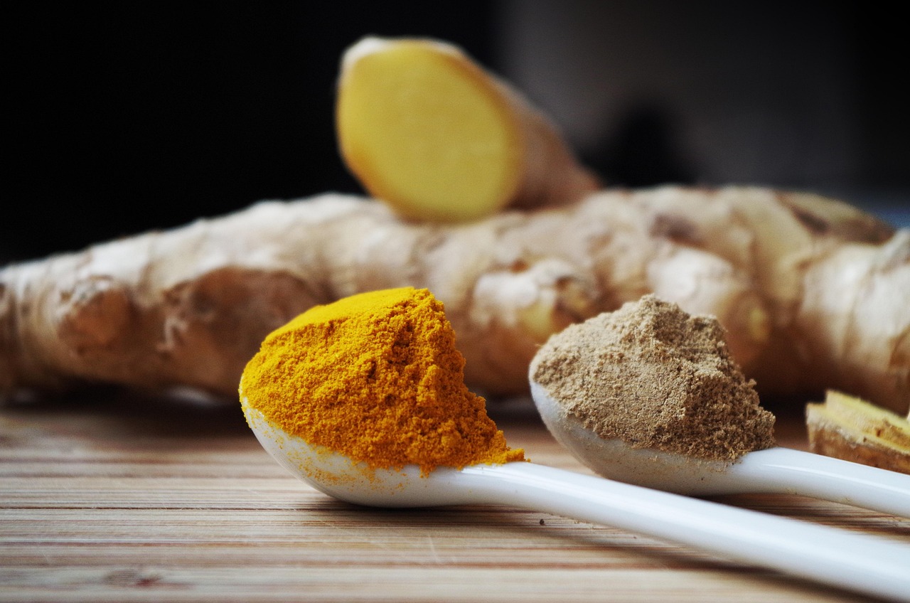 Bright orange turmeric powder, used as a natural anti-inflammatory supplement